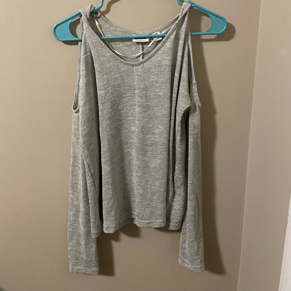 Never worn!! Cute cold shoulder glitter top; long sleeve